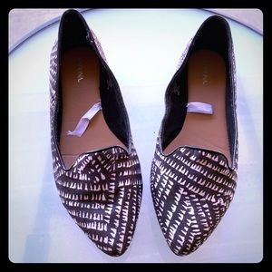 Black and White gently used flat.....